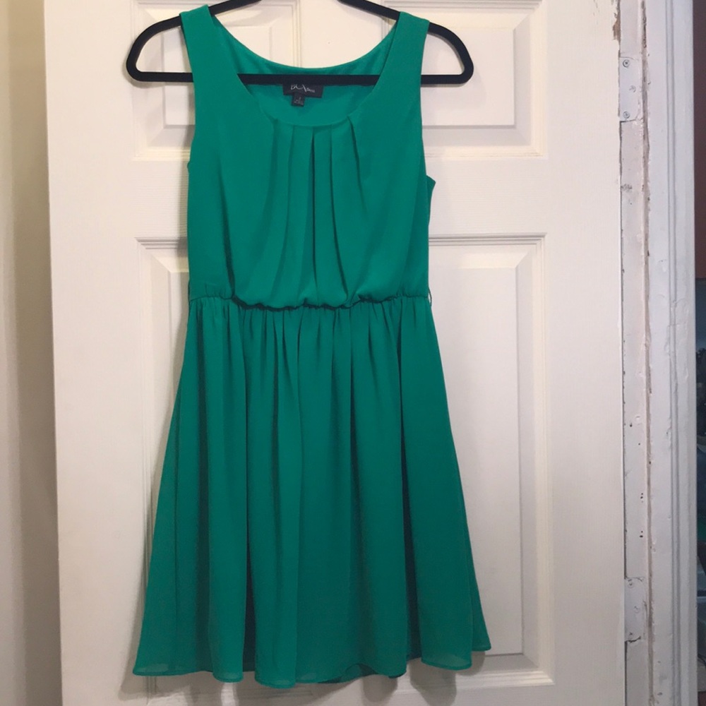 Flowing green sleeveless dress